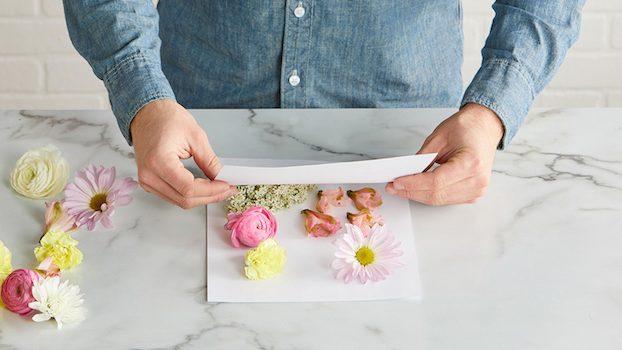 dried flowers on book